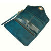 Open Teal Leather Purse with Wrist Strap on White Background
