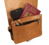 Inside of a Square Tan Saddle Bag Showing Zipped Pocket with phone Keys and Passport